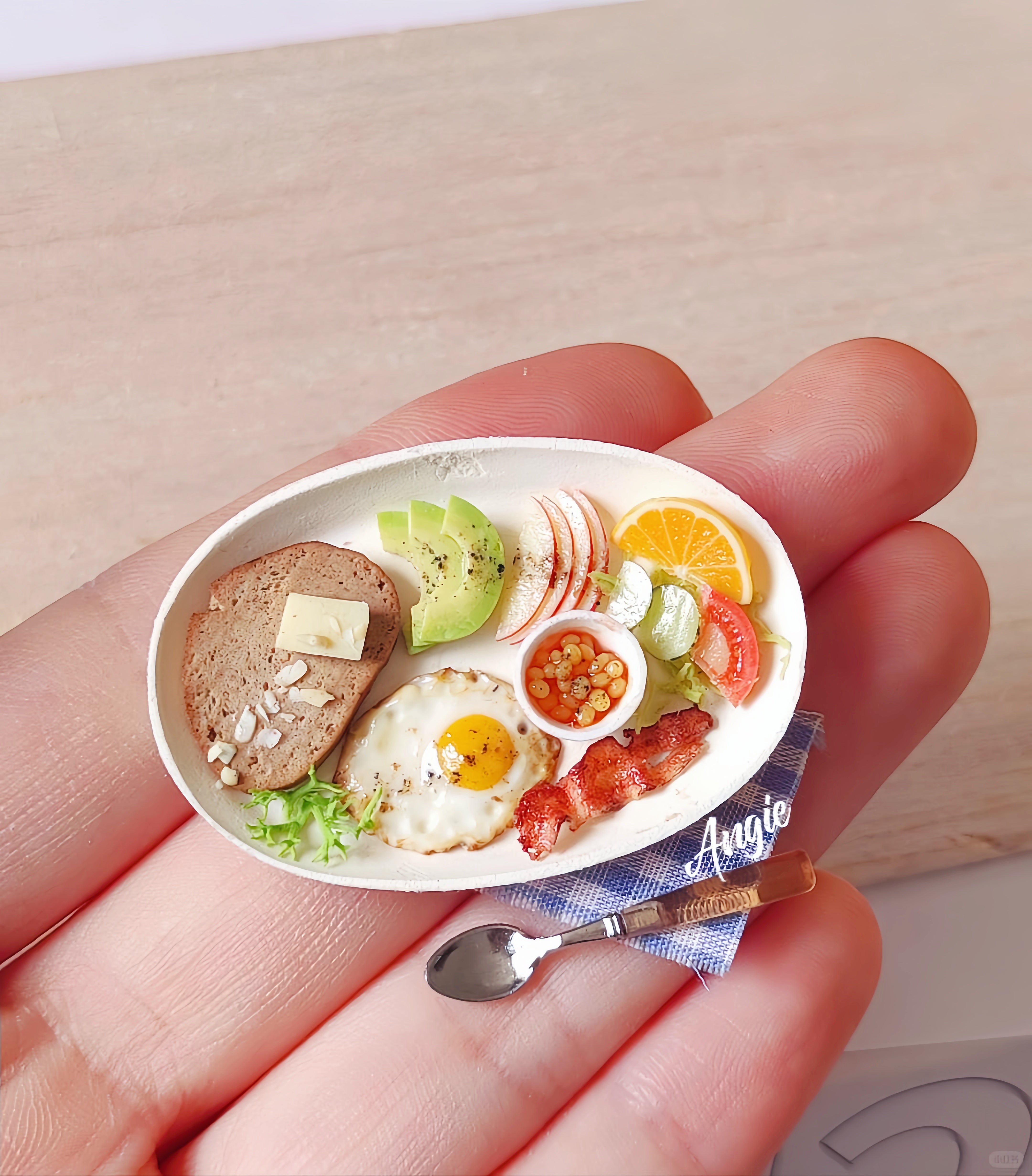 38mm miniature breakfast plate held in a hand